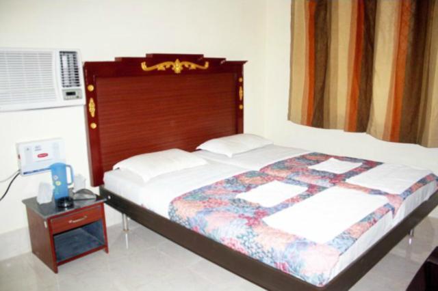 Hotel Maa Kamakhya Purí Pokoj fotografie