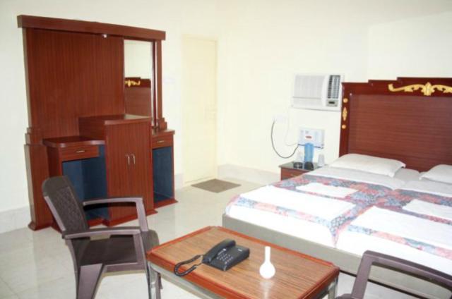 Hotel Maa Kamakhya Purí Pokoj fotografie